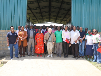 A group photo of the members of Rongai Acacia Dairy Farmers Cooperative Society with the MESPT staff and BOT during the field visit